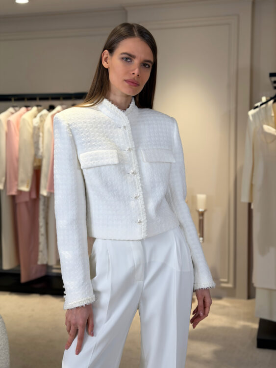 Milk-colored suit with palazzo trousers and a tweed jacket